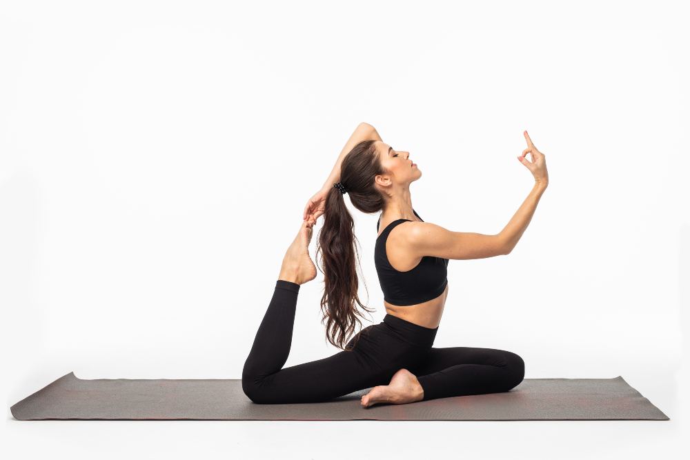 A Yoga Practitioner Practicing Vinyasa Yoga A Yoga Practitioner Practicing Vinyasa Yoga
