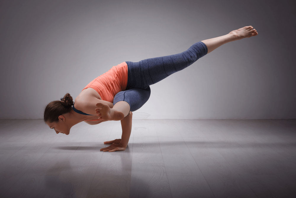 Women Practicing Ashtanga Yoga to Improve Muscle Tone