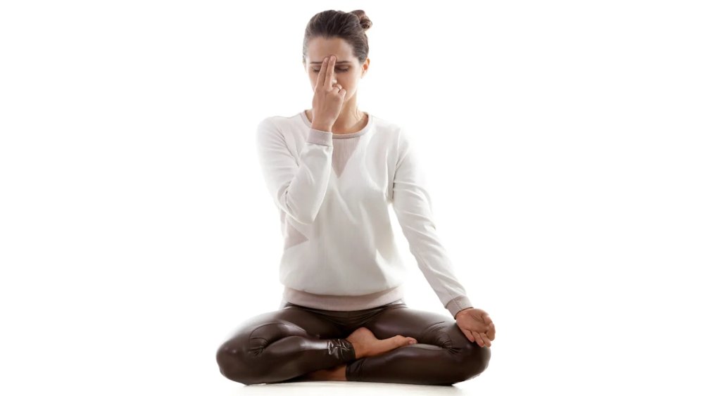 Women Practicing Channel Cleaning Breath