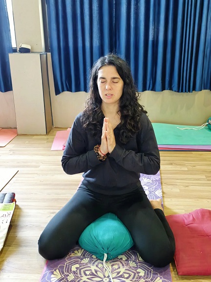 Student Performing Vajrasana Pose (Thunderbolt)