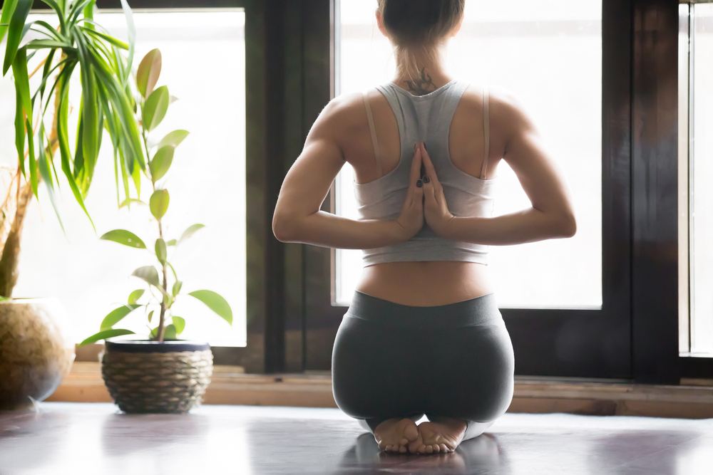 Woman Sitting in Vajrasana Pose