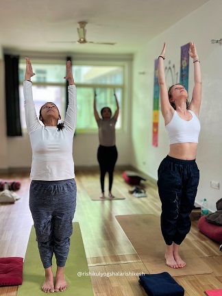 Student Performing Tadasana During Yoga Teacher Training at Rishikul Yogshala Rishikesh