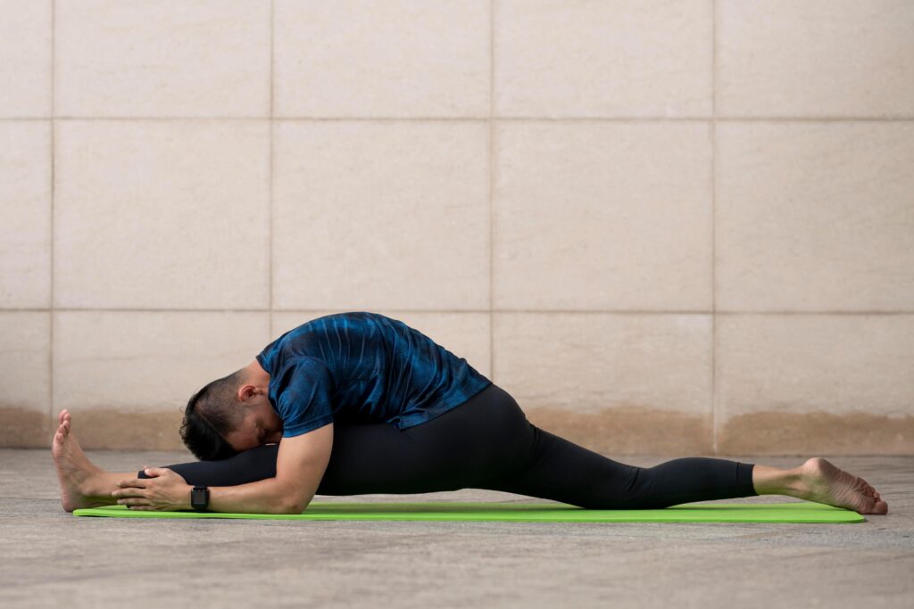 Yoga Practitioner Doing Janu Sirsasana Yoga Practitioner Doing Janu Sirsasana