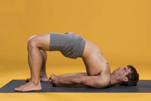 Student Performing Bridge Pose Student Performing Bridge Pose