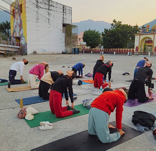 Student Practising Camel Pose Ustrasana During 200 Hour YTTC at Rishikul Yogshala Rishikesh
