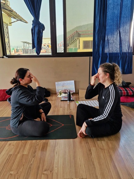 Student Performing Anulom Vilom Pranayama During TTC at Rishikul Yogshala Rishikesh Student Performing Anulom Vilom Pranayama During TTC at Rishikul Yogshala Rishikesh