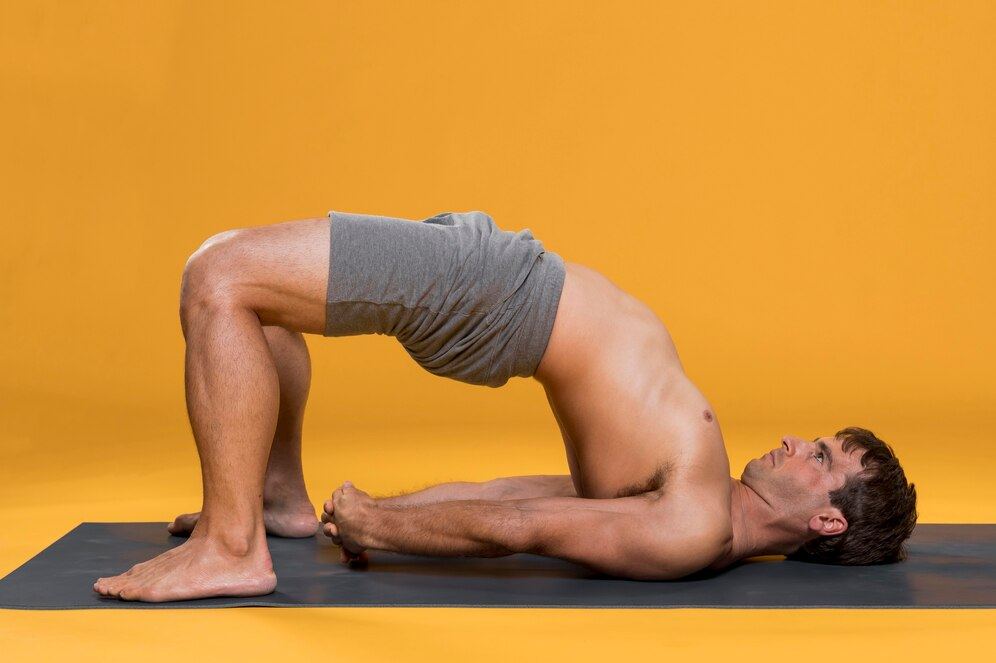 Yoga Practitioner Performing Setu Bandhasana Yoga Practitioner Performing Setu Bandhasana