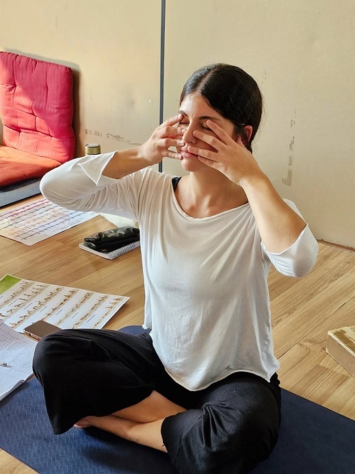 Student Performing Bhramari Pranayama (Humming Bee) During 200 Hour YTTC at Rishikul Yogshala, Rishikesh