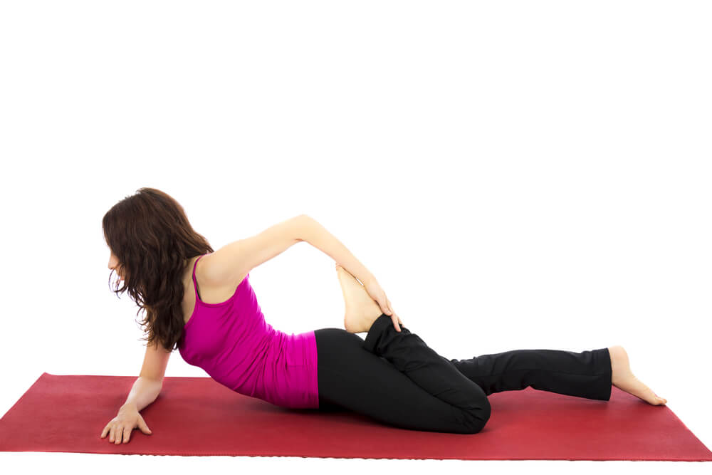 Women Performing Half Frog Pose Yoga for Better Spinal Alignment Women Performing Half Frog Pose Yoga for Better Spinal Alignment