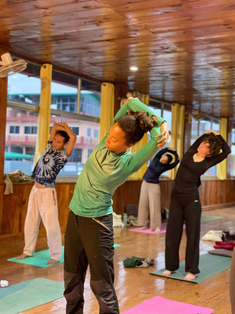 Student Practicing Yoga during 200 Hour YTTC at Rishikul Yogshala Student Practicing Yoga during 200 Hour YTTC at Rishikul Yogshala