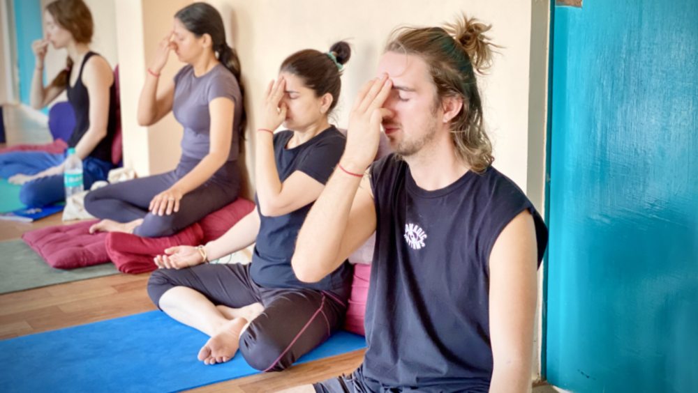 Students Practicing Kundalini Yoga Students Practicing Kundalini Yoga