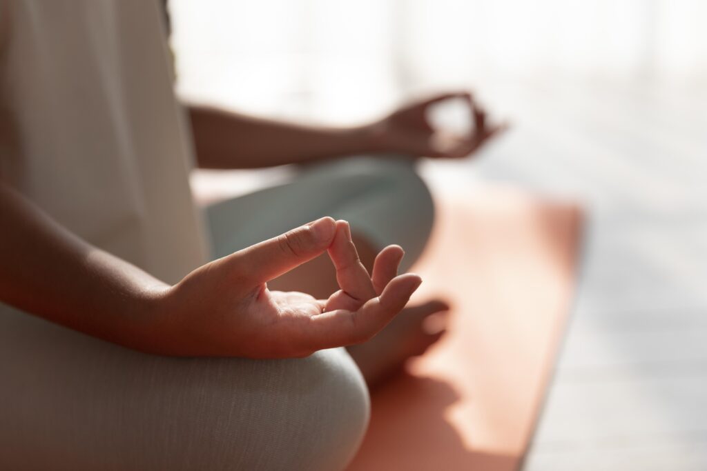 Person Meditating in Gyan Mudra Person Meditating in Gyan Mudra