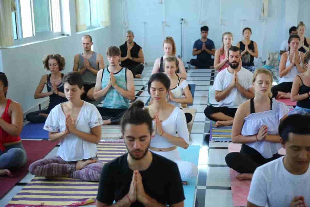 Group of Yoga Students Practising Meditation at Rishikul Yogshala Rishikesh Group of Yoga Students Practising Meditation at Rishikul Yogshala Rishikesh