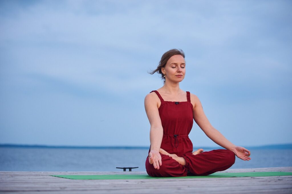 Woman Practicing Dirga Pranayama Woman Practicing Dirga Pranayama