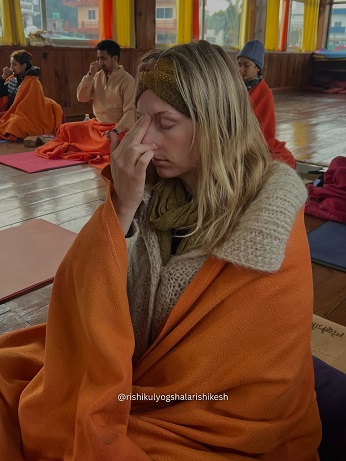 Student Practising Nadi Shodhana During 200 hour Yoga TTC at Rishikul Yogshala