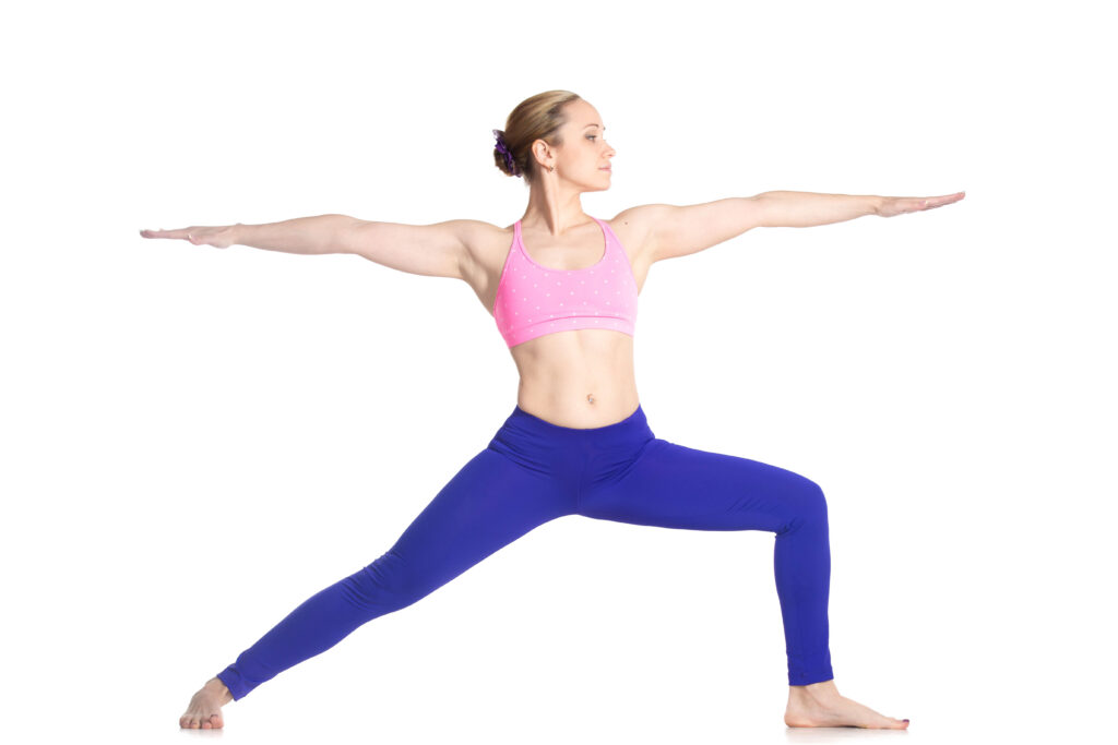 Lady Performing Virabhadrasana 2 (Warrior II ) Lady Performing Virabhadrasana 2 (Warrior II )