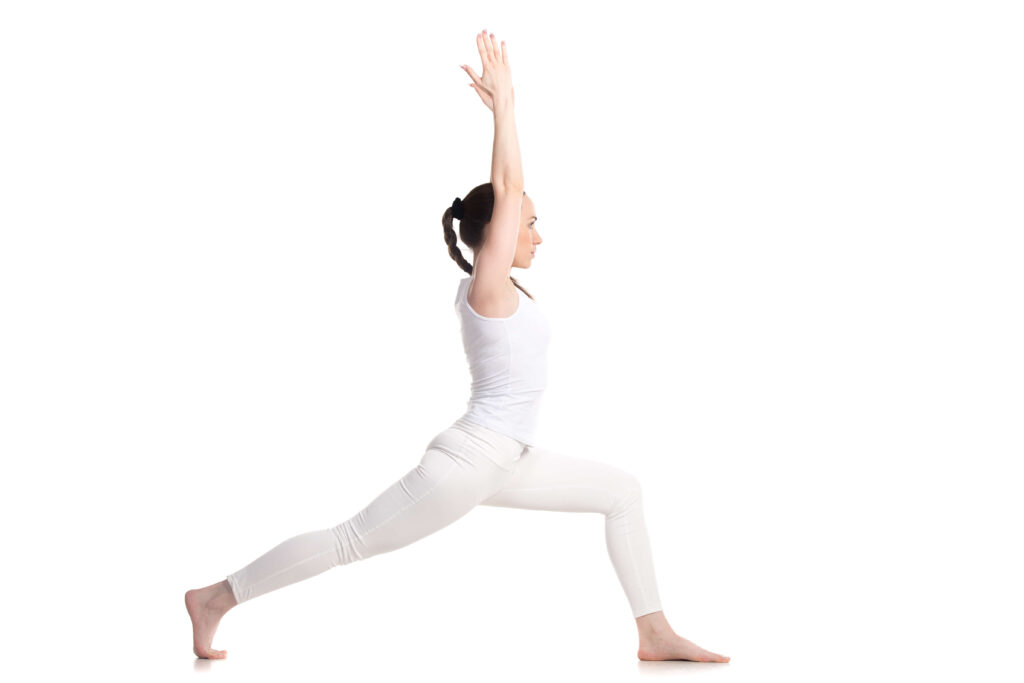 Yoga Student Performing Virabhadrasana Yoga Student Performing Virabhadrasana