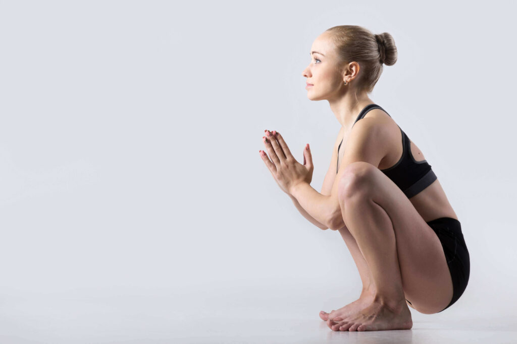 Yoga Instructor Practicing Malasana in Daily Life