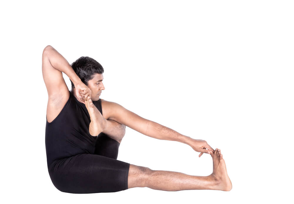 Student Performing Akarna Dhanurasana (Archer’s Pose) Student Performing Akarna Dhanurasana (Archer’s Pose)