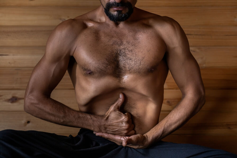 Practitioner Performing Nauli Kriya Practitioner Performing Nauli Kriya