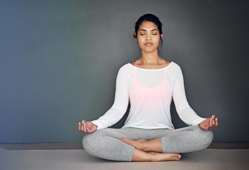 Student Performing Ujjayi Pranayama Student Performing Ujjayi Pranayama