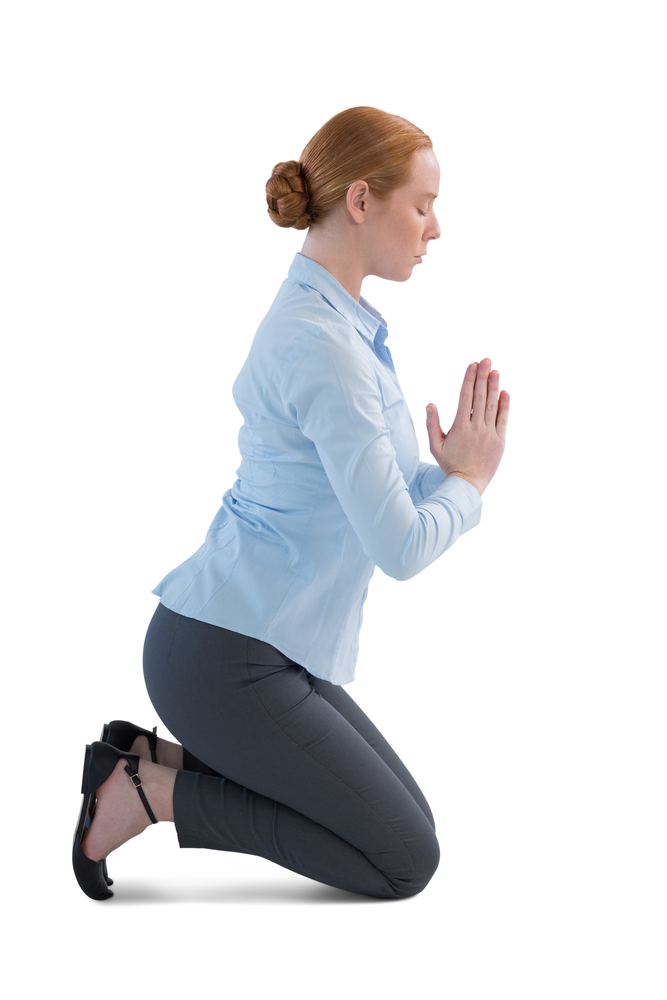 Women doing Kneeling Prayer Pose Women doing Kneeling Prayer Pose