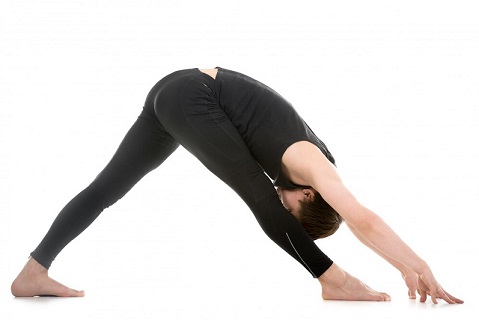 Student Performing Intense Side Stretch Pose Student Performing Intense Side Stretch Pose