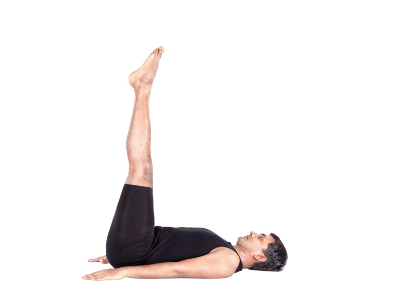 Yoga Practitioner Performing Uttanpadasana Yoga Practitioner Performing Uttanpadasana