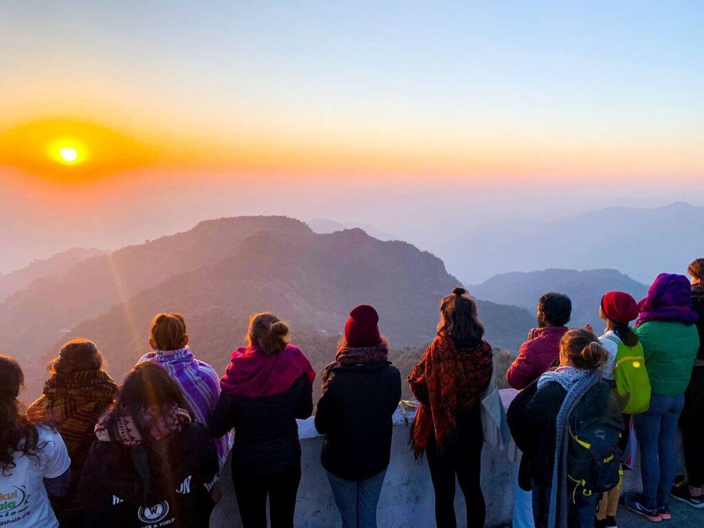 Why Should You Visit Rishikesh in The Month of April? 2 People Enjoying Rishikesh Sunset