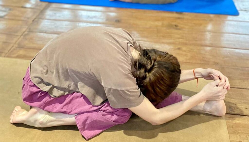 Student Practicing Yoga Pose During Yoga Teacher Training in Rishikesh Student Practicing Yoga Pose During Yoga Teacher Training in Rishikesh