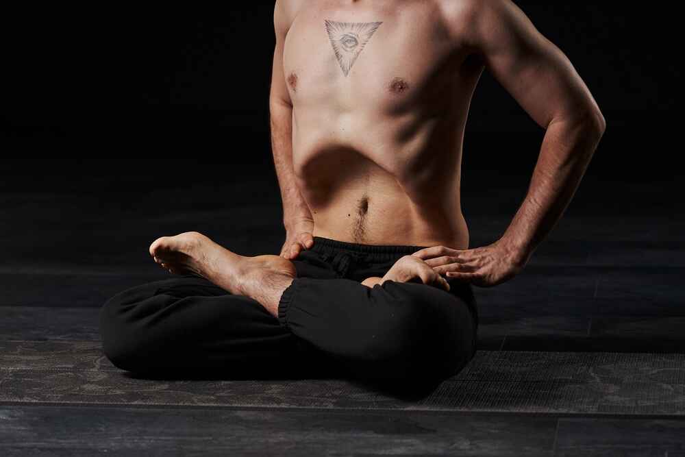 Man Practicing Uddiyana Bandha 