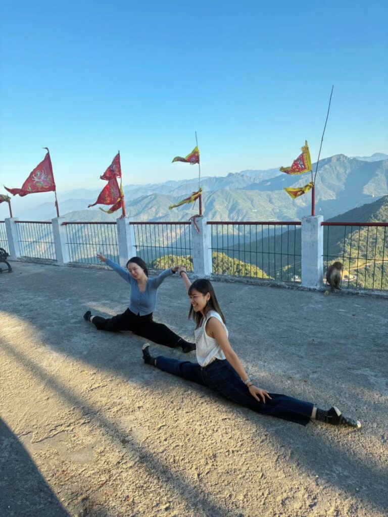 Women Practising Yoga at Kunjapuri Temple Women Practising Yoga at Kunjapuri Temple