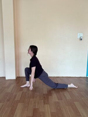 Surya Namaskar: The 12 Poses of Sun Salutation, Step by Step 4 Student Practicing Ashwa Sanchalanasana During the 12 Poses of Sun Salutation