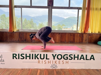 Student Performing Bakasana