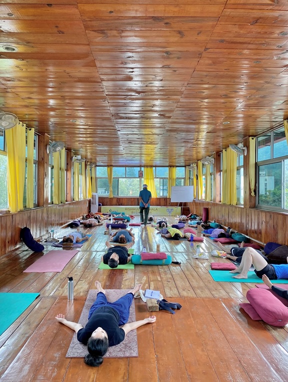 Student Practicing Shavasana (Corpse Pose) During YTTC