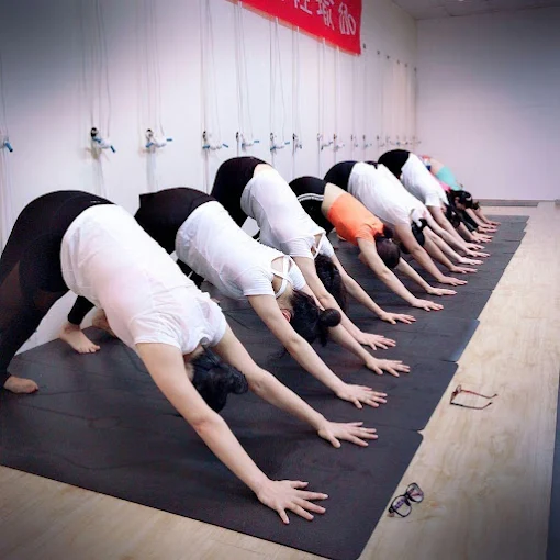 Student During Yoga Session at Frog Lotus Yoga International