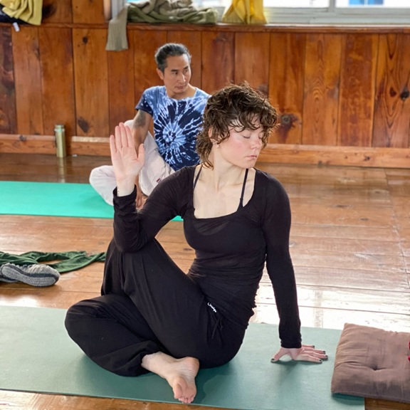 Student practising Ardha Matsyendrasan
