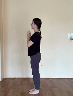 Surya Namaskar: The 12 Poses of Sun Salutation, Step by Step 1 Student Practicing Pranamasana During the 12 Poses of Sun Salutation