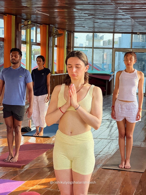 Student Practising Samasthiti During Yoga TTC at Rishikul Yogshala Rishikesh