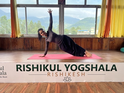 Students Performing Side Plank Pose