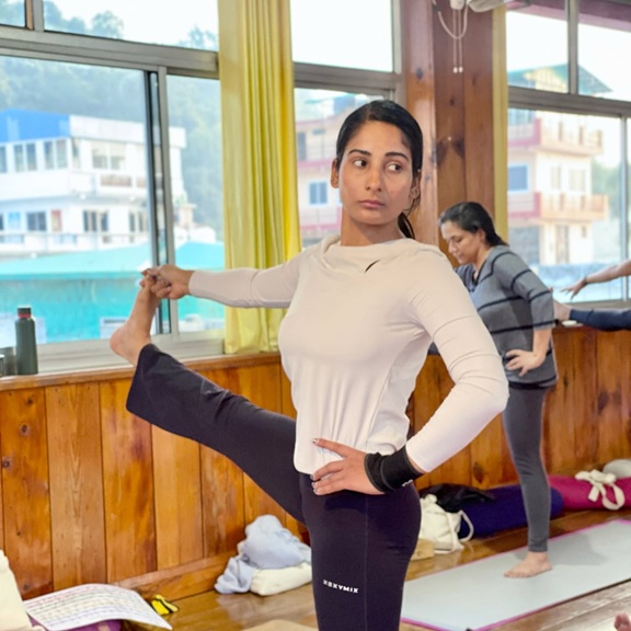 Student Practicing Padangusthasana