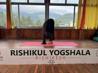Student Performing Uttanasana