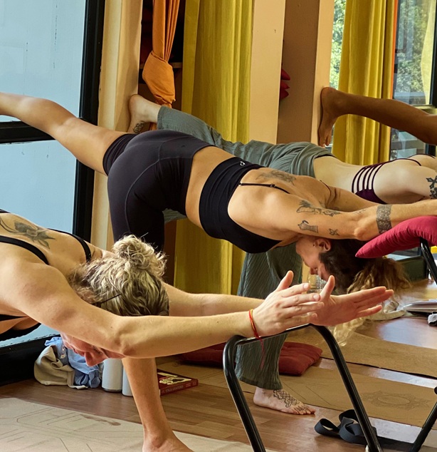 Student Practicing Virabhadrasana 3 (Warrior 3 Pose)