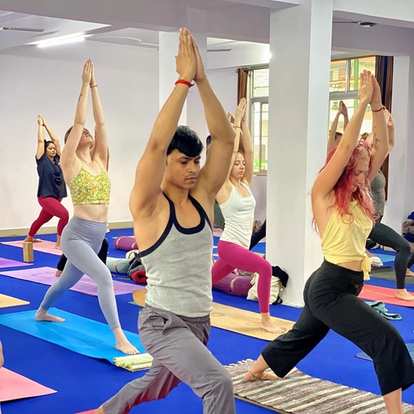 Student Performing Virabhadrasana I (Warrior Pose I)