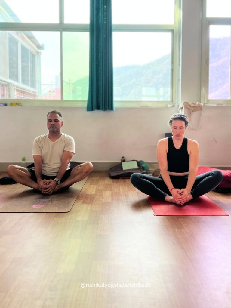 Student Practising Baddha Konasana During Yoga TTC at Rishikul Yogshala Rishikesh
