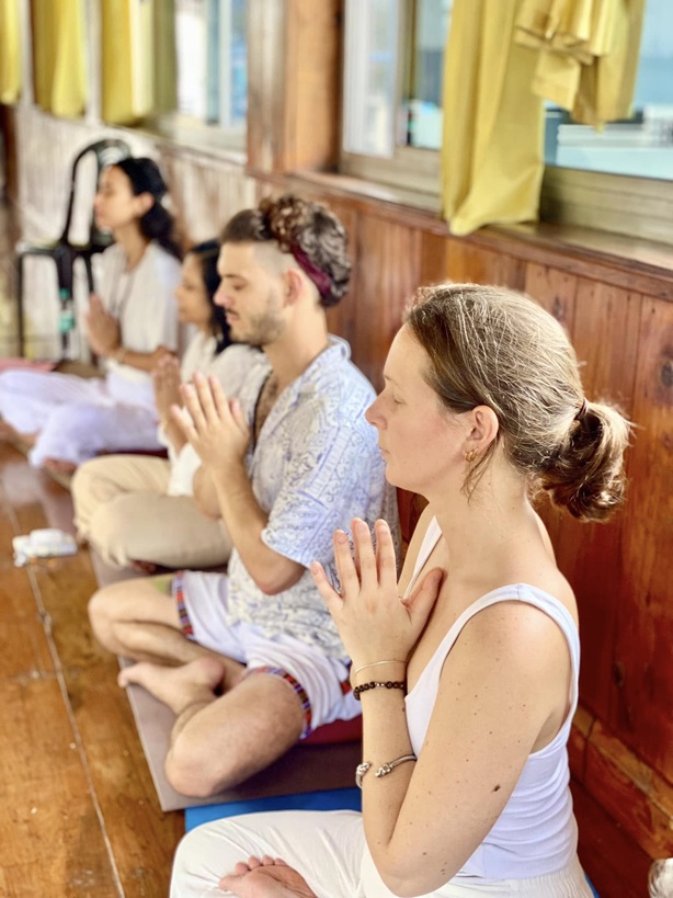 Student Practicing Sukhasana (Easy Pose)