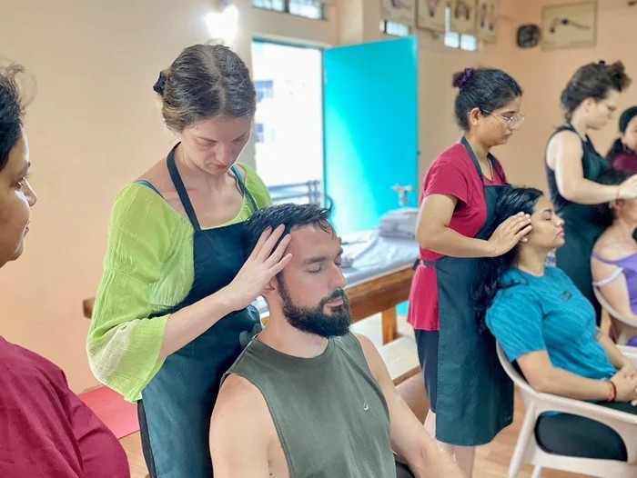 Students Practicing Ayurveda massage during 300 Hour YTTC