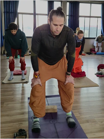 Student performing advanced yoga pose at Rishikesh yoga school